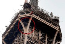 hombre-escala-eiffel-