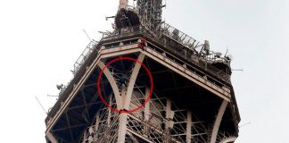 hombre-escala-eiffel-