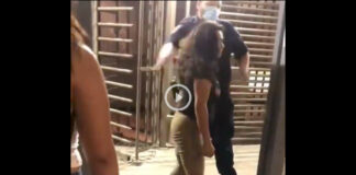 video mujer escupe oficial migracion mexicali garita